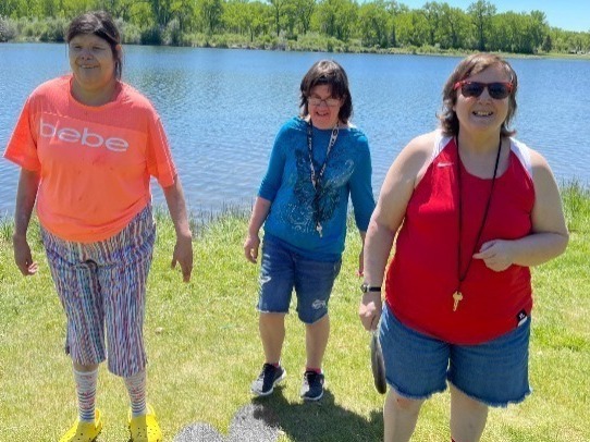 women by the river